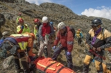 How Do You Handle Common Hiking Emergencies Like Injuries or Sudden Weather?